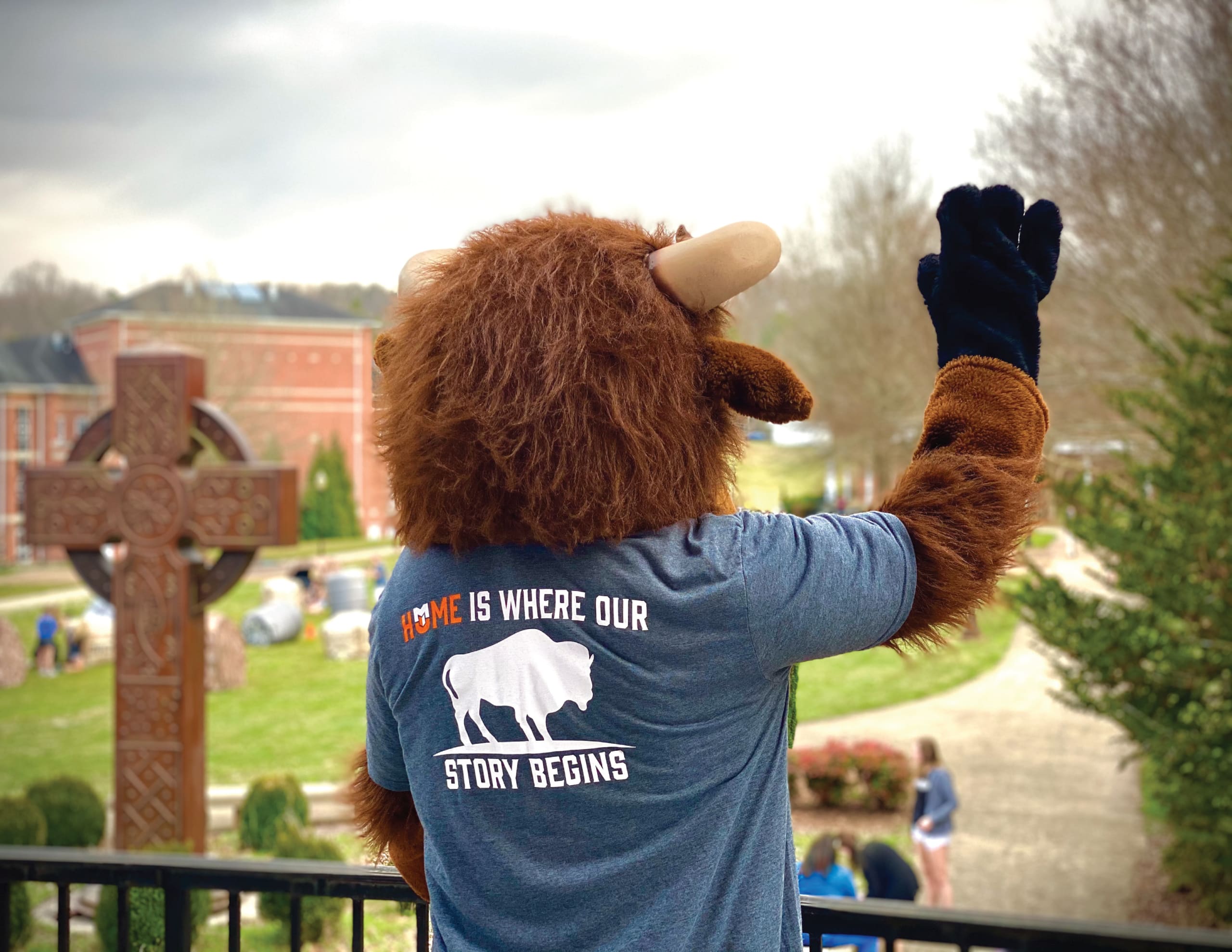 Brutus overlooking and waving to campus